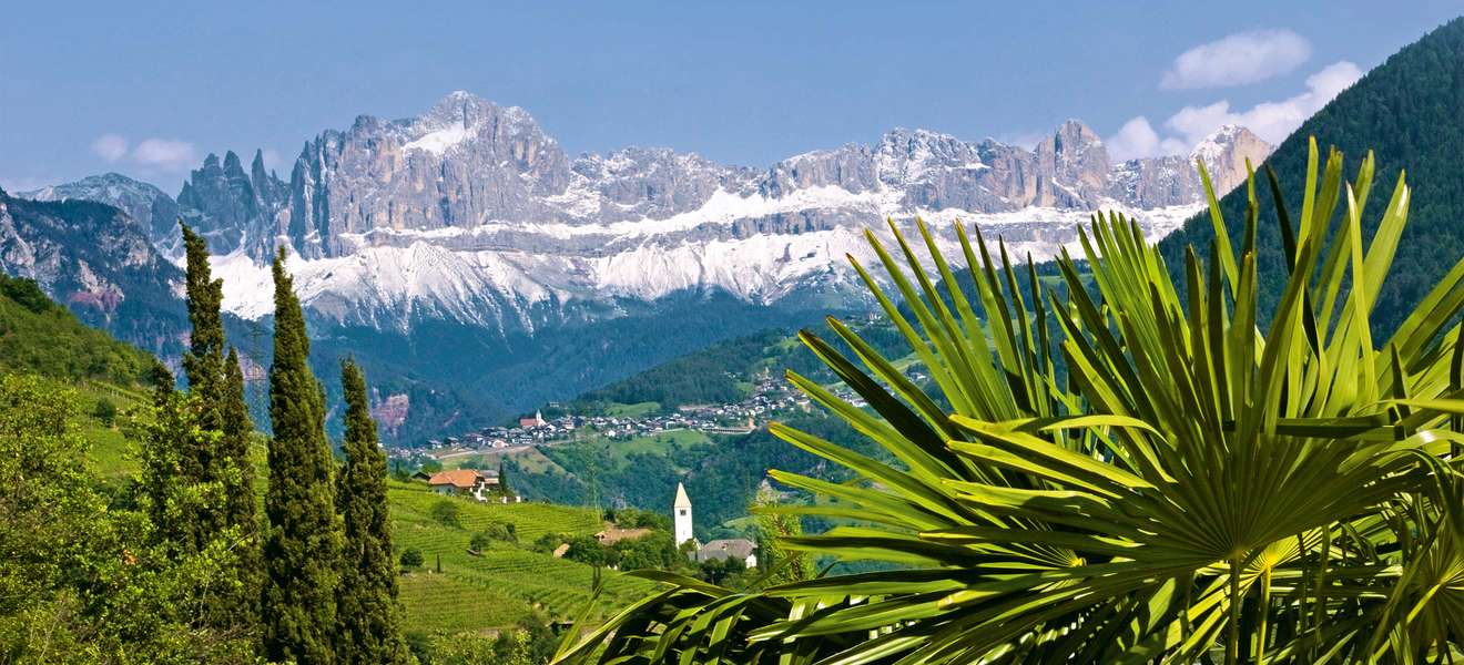 Gebirgslandschaft trifft auf  südliches Flair. Südtirol gilt seit  jeher als Tor in den Süden. 