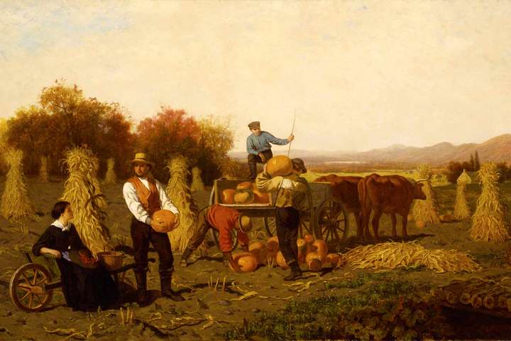 Feldmitarbeiter bringen die orangefarbige Ernte ein: In den Vereinigten Staaten spielt Kürbis seit Jahrhunderten eine große Rolle.